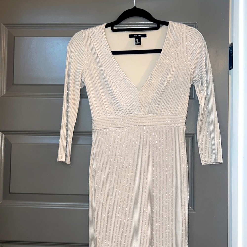 Forever 21 new in excellent condition.  Doesn't fit me is a size small